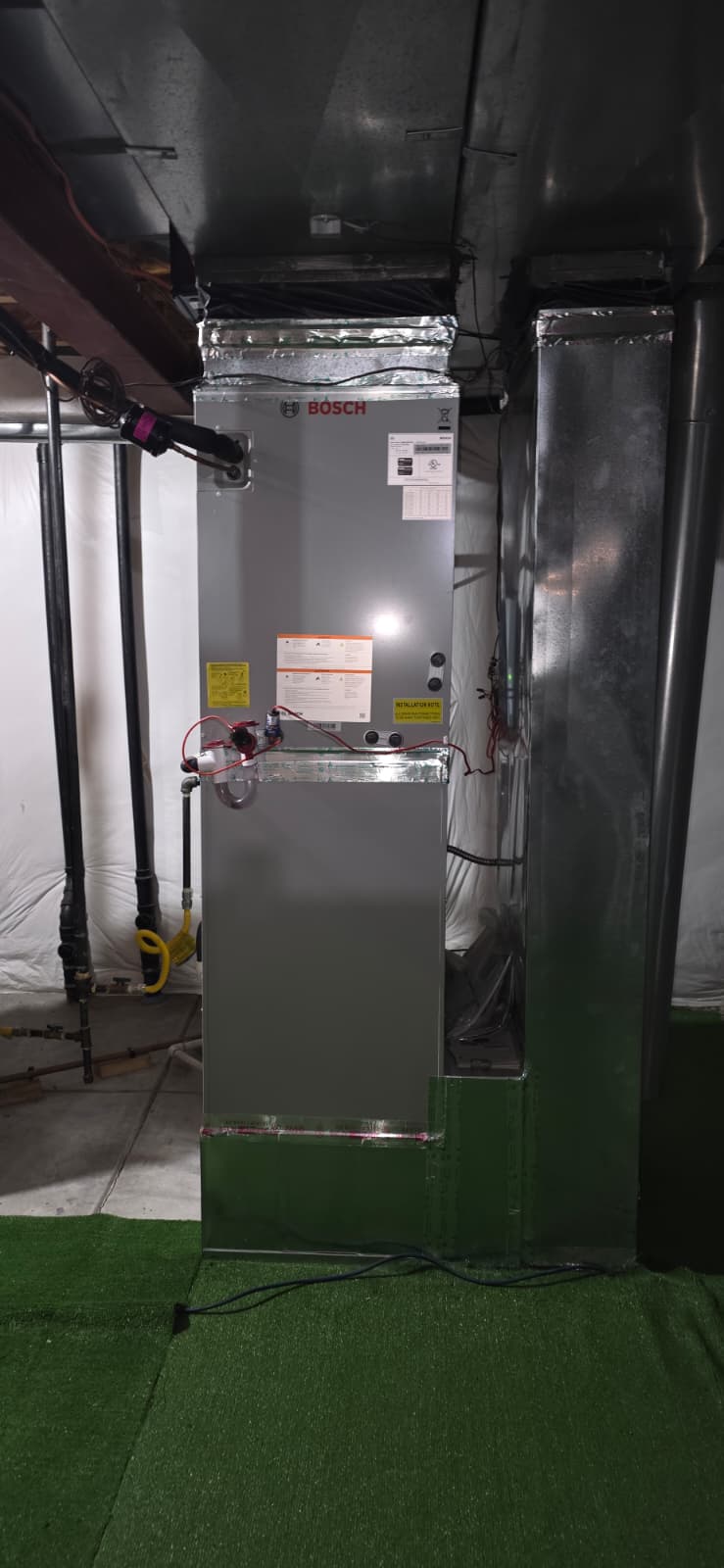 Bosch furnace installed in a utility closet