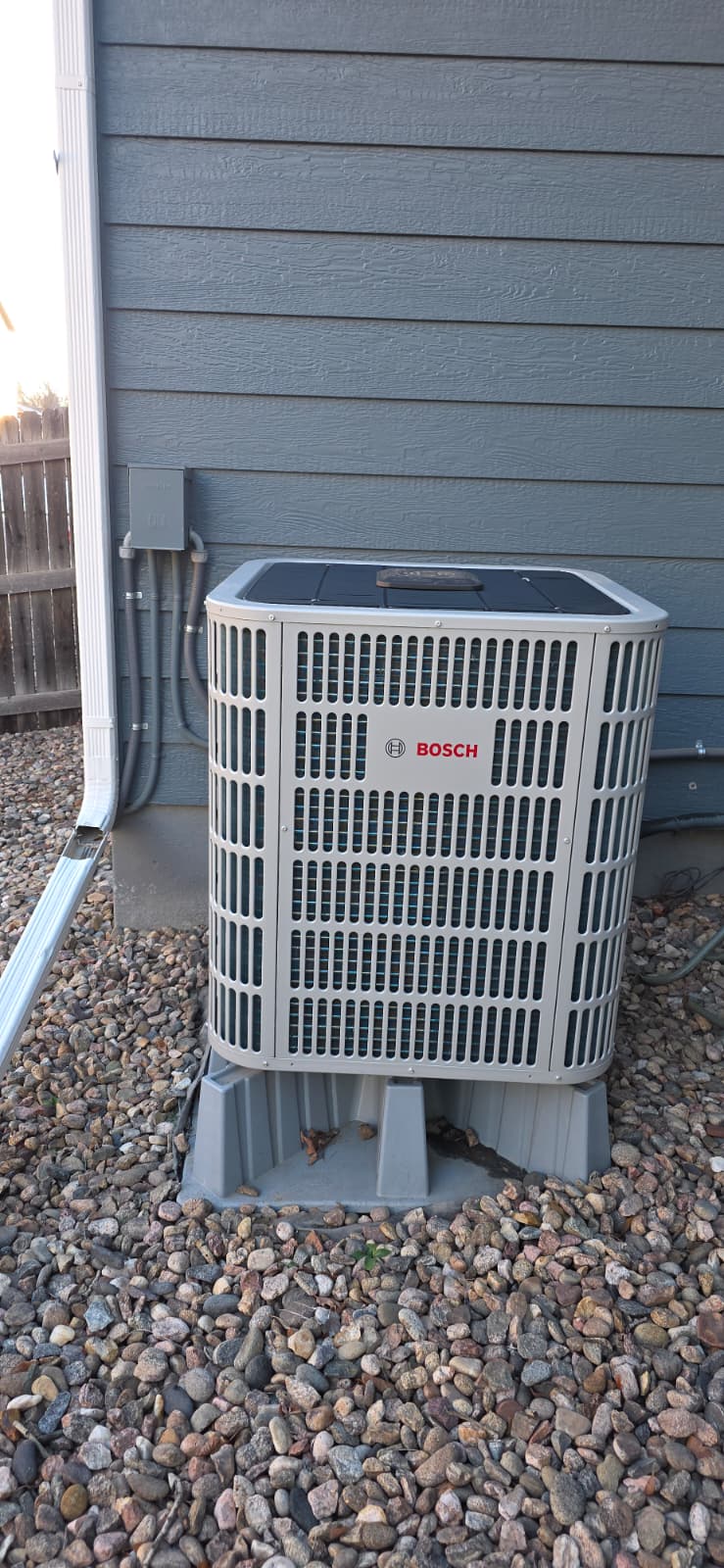 Bosch AC condenser installed outside a home